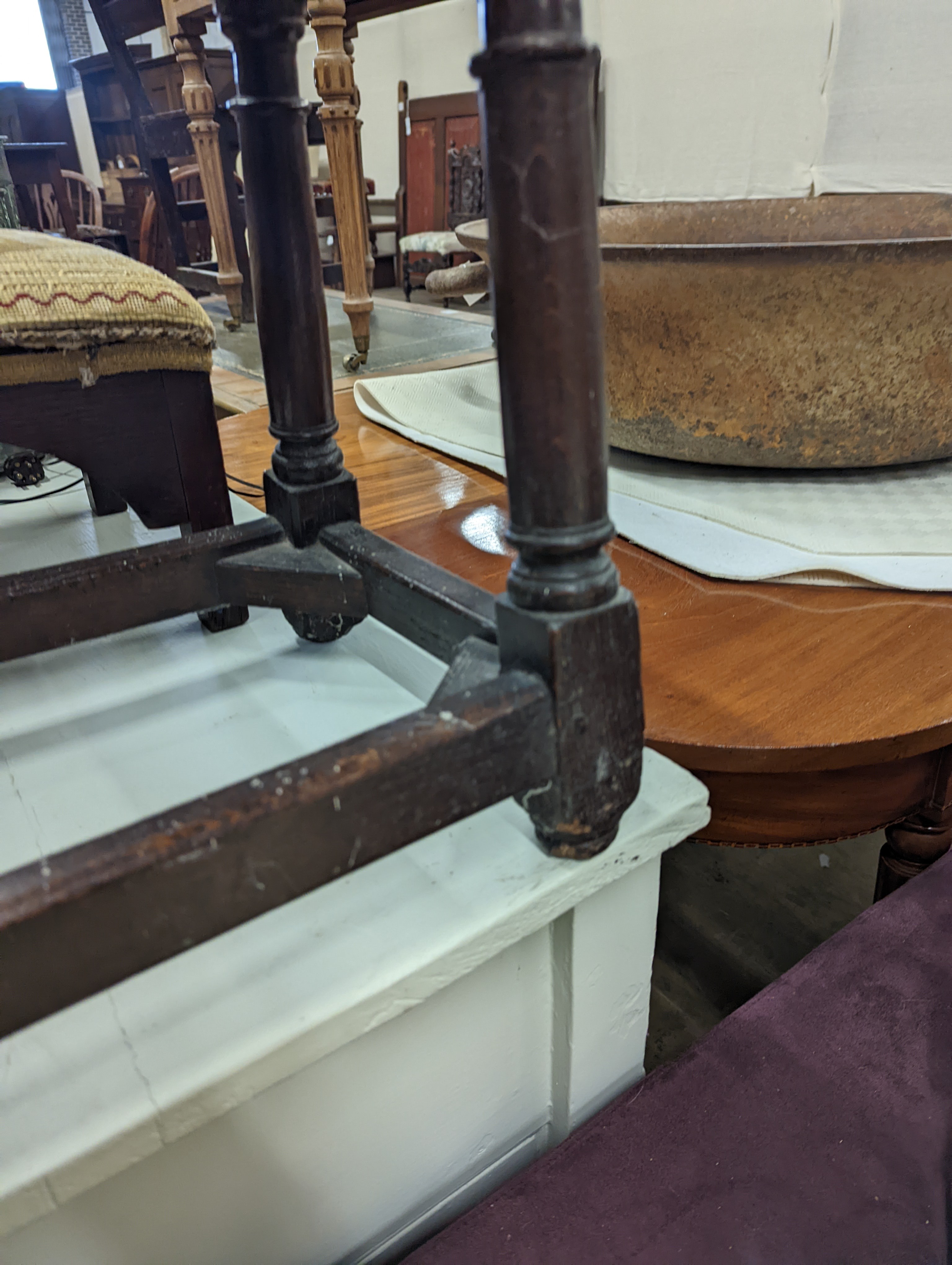 A 17th century style oak joint stool, width 46cm, depth 26cm, height 46cm and a George III stool with Victorian needlework seat, length 33cm